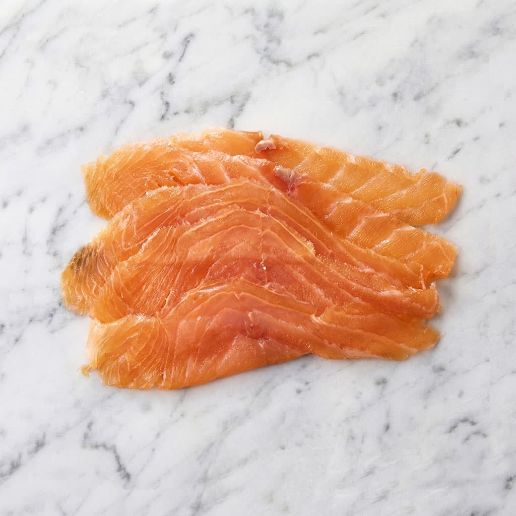 SAUMON FUMÉ TRANCHÉ À LA MAIN (100 g)